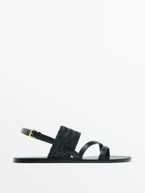 Black plaited sandals